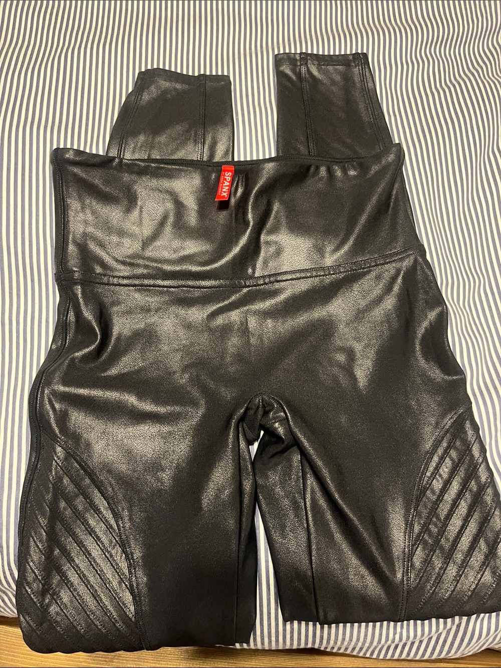 Size S spanx faux leather moto leggings.